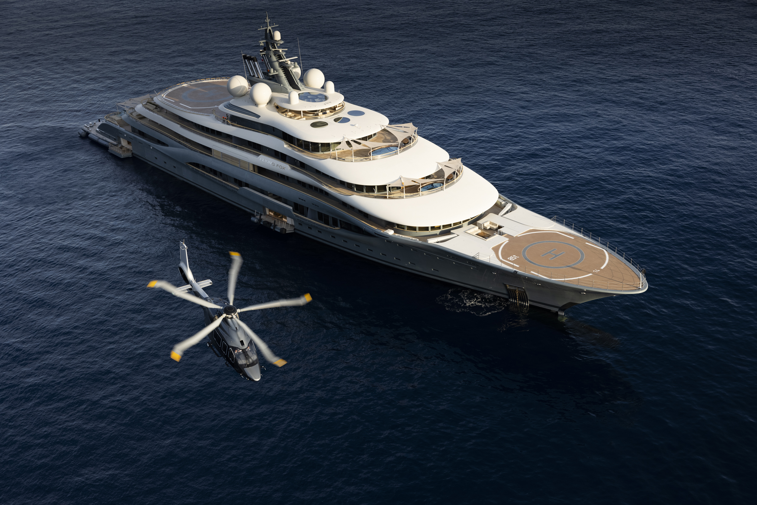 helicopters above yachts